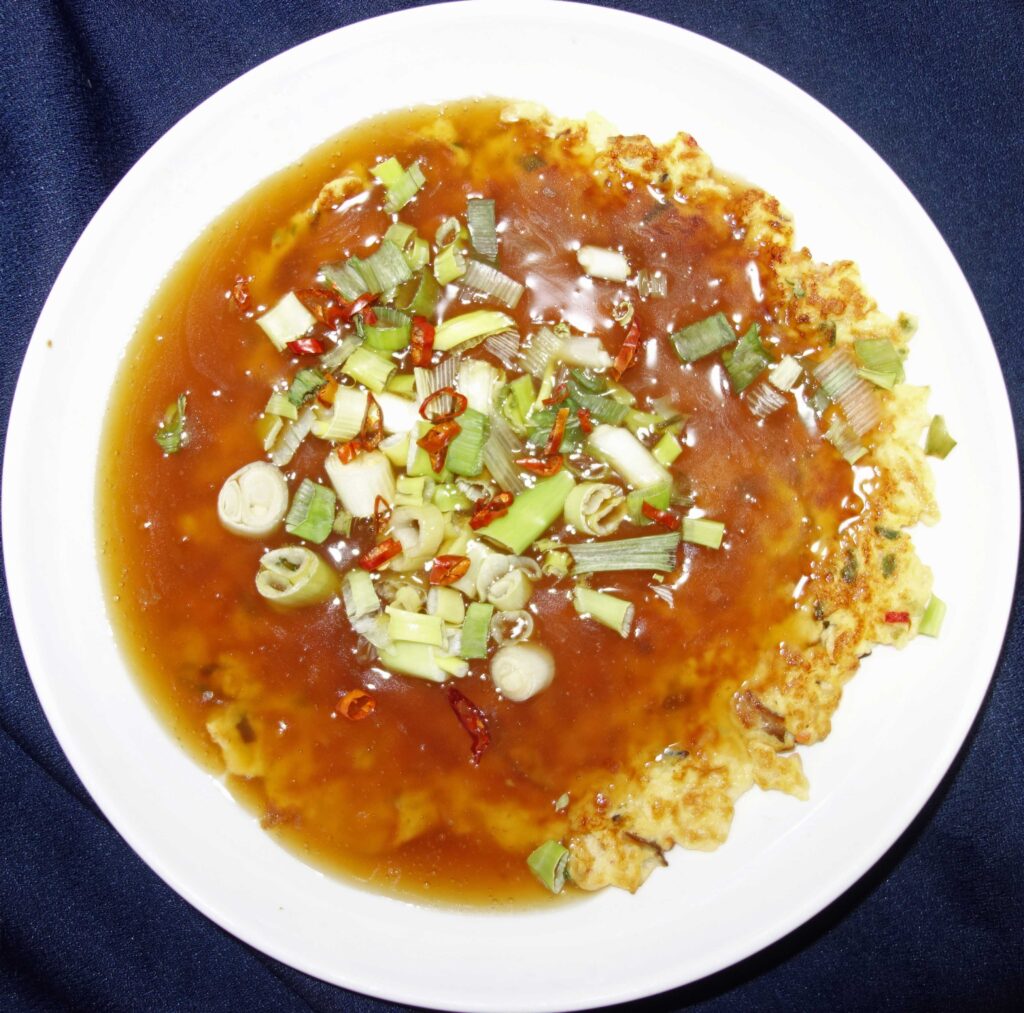 ネギと唐辛子をかけたかに玉